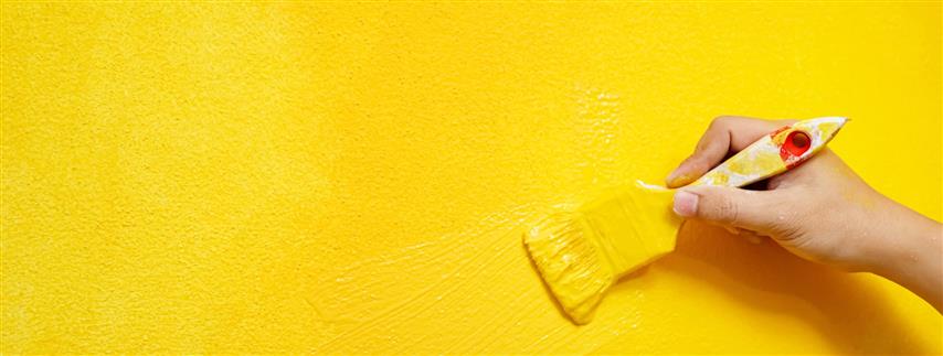 painter-is-painting-walls-yellow-with-interior-home-living-room (Small)